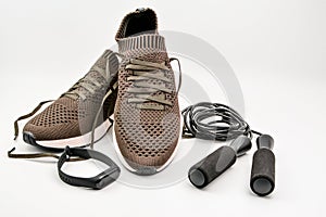Sport equipment. New green Sport shoes on white background