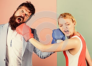 Sport for everyone. family couple boxing gloves. bearded man hipster fighting with woman. knockout punching. who is