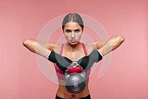 Sport Exercising. Athletic Woman Training With Dumbbell