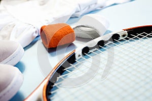 Sport and fitness healthy lifestyle slat lay with tennis racket and athletic wear.