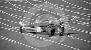 sport fitness man and woman training together stand in plank and do push up