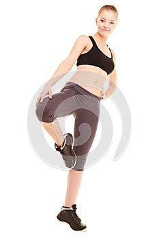 Sport. fitness sporty blonde girl stretching leg i