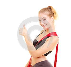 Sport. Fitness sporty girl with gym bag showing thumb up