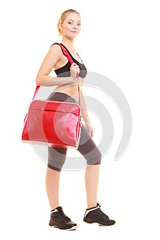 Sport. Fitness sporty girl in sportswear with gym bag