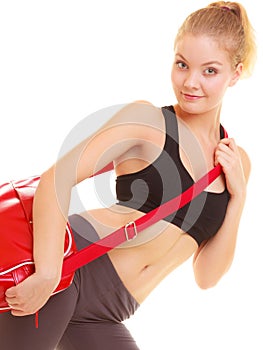 Sport. Fitness sporty girl in sportswear with gym bag