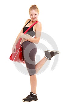 Sport. Fitness sporty girl in sportswear with gym bag