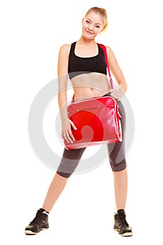 Sport. Fitness sporty girl in sportswear with gym bag