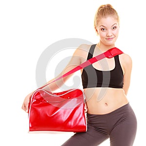 Sport. Fitness sporty girl in sportswear with gym bag