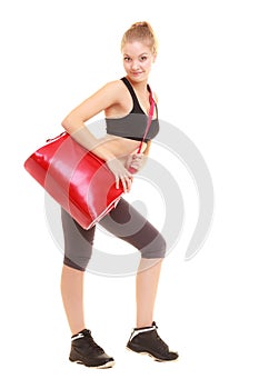 Sport. Fitness sporty girl in sportswear with gym bag