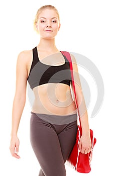 Sport. Fitness sporty girl in sportswear with gym bag