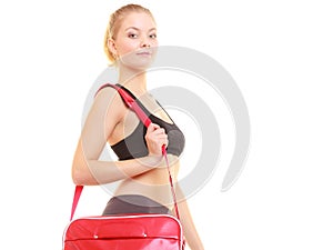 Sport. Fitness sporty girl in sportswear with gym bag