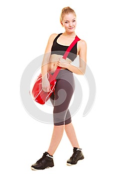 Sport. Fitness sporty girl in sportswear with gym bag