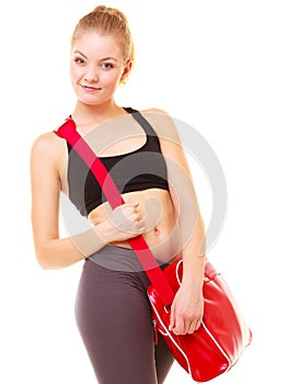 Sport. Fitness sporty girl in sportswear with gym bag