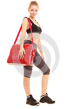 Sport. Fitness sporty girl in sportswear with gym bag