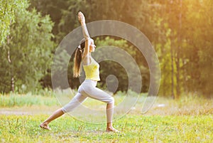 Sport, fitness, yoga - concept, woman doing exercise outdoors