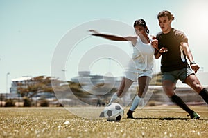 Sport, friends and soccer with man and woman playing on a soccer field, competitive training for sports goal. Fitness