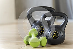 Sport gym background. Dumbbells and fitness equipment in the gym. Healthy lifestyle, aerobics, workout concept.