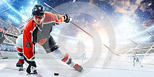 Sport. High concentration. Professional hockey player ready to attack in ice. Sports emotions. Concept of action, team