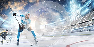 Sport. High concentration. Professional hockey player ready to attack in ice. Sports emotions. Concept of action, team