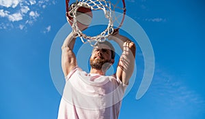 sport and hobby. dunk in basket. slam dunk in motion. high view. summer activity.