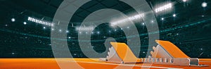 Sport indoor athletics arena with start blocks on the ground as widescreen background.