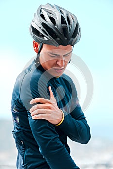 Sport, injury and arm pain with man cyclist during exercise routine outdoors, fitness, hurt and discomfort. Health