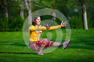 Sport and lifestyle concept - woman doing sports