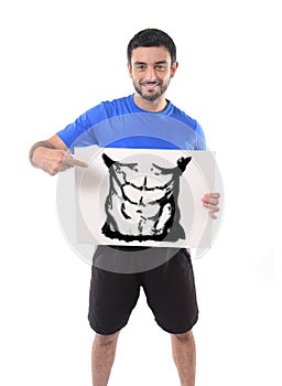 Sport man holding billboard with six pack abdomen draw advertising marketing of gym fitness club