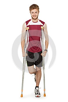 Sport man injured fitness on crutches