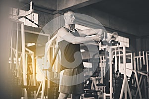 Sport man stretching for warming up befor doing wrist exercises training,Black and white toned