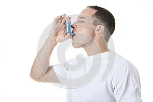 Sport man using a asthma pump