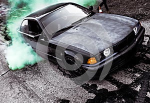 Moldova 25.09.2019. Sport modern Stance E36 BMW Car racing car drifting with smoke drift burnout, Huge green clouds