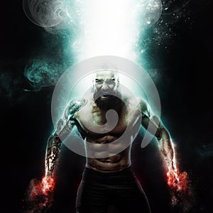 Sport and motivation wallpaper on dark background. Power athletic guy bodybuilder. Fire and energy