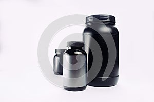 Sport Nutrition, Whey Protein and Gainer. Black Plastic Jars iso photo