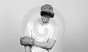 Sport is our life. modern gadget. Training boxing game. vr boxing. future innovation. man in VR glasses. Futuristic