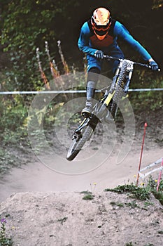 Sport race Mountain biker extreme and fun downhill track.