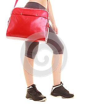 Sport. Red gym bag of fitness sporty girl in sportswear