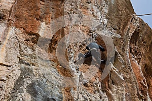 Sport rock climbing on natural rocks