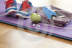 Sport shoes with energy drink and phone