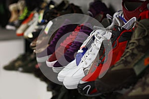 Sport shoes in multiple colors on a shop shelf