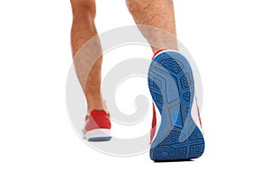 Sport shoes of walking mature man