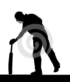 Sport Silhouette - Cricket Batsman Checking Pitch