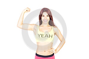 Sport smiling woman shows off his muscles. Sports and fitness concept.
