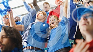 Sport Stadium Big Event: Crowd of Fans Cheer for Blue Soccer Team to Win. People Celebrate Scoring a