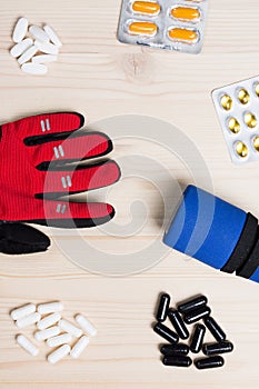 Sport Supplements, a barbell and sport glove