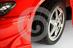 Sport tyre in the red car photo