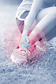 Sport woman ankle injury