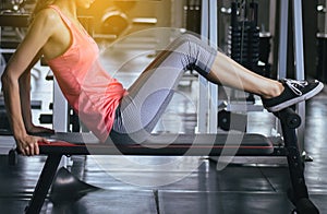 Sport woman doing situp or crunches in gym,Female exercise muscular her stomach,Close up