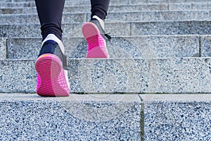 Sport woman doing workout outdoor in city