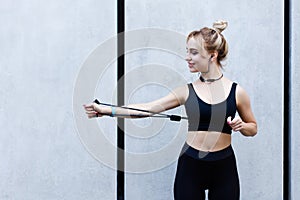 Sport woman doing workout outdoor in city